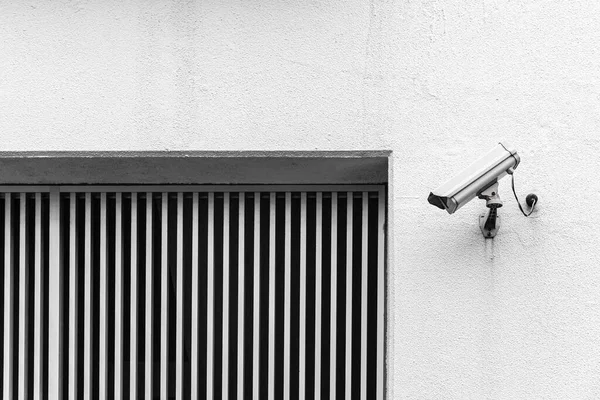 Video camera security system on the wall of the building