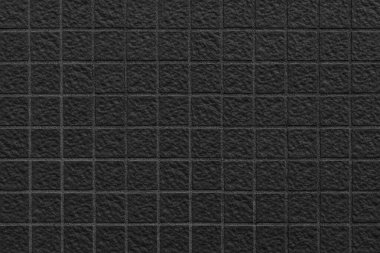 Üçgen desenli ve pürüzsüz arkaplanı olan modern siyah mozaik duvar fayansları