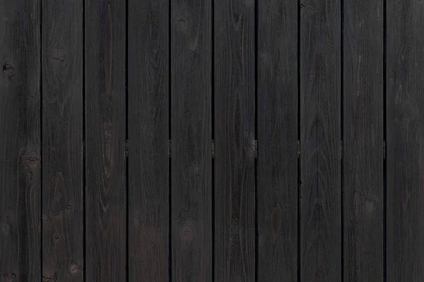 黒塗装木製のフェンスのテクスチャとシームレスな背景 — ストック写真