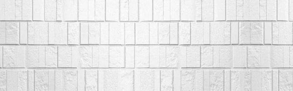 Panorama of White granite block wall pattern and background seamless