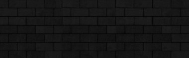 Siyah beton blok çit dokusu ve pürüzsüz arkaplan manzarası