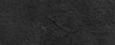 Koyu gri arka plan ya da doku panoraması. Siyah granit levhalar arka plan