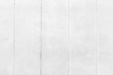 Beton duvar beyaz dokuya boyanmış ve arka plan pürüzsüz.