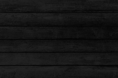 Eski siyah eski ahşap duvar deseni ve pürüzsüz bir arka plan.