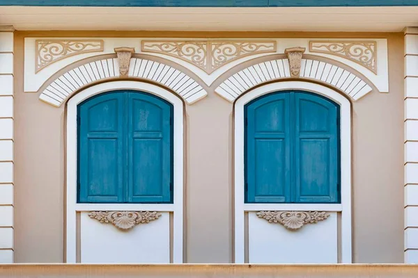 Antique European Blue Arched Wooden Windows Patterned Cement Walls — 图库照片