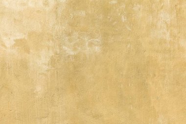 Eskimiş kahverengi stil ve arka plan dikişsiz boyanmış eski beton duvar