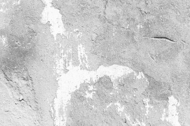 Eski beton duvar beyaza boyanmış, boya dokusu ve arka planı soyulmuş.