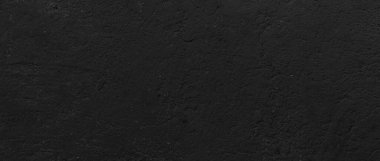 Eski beton duvar manzarası siyaha boyanmış, boya dokusu ve arka plan soyulmuş.