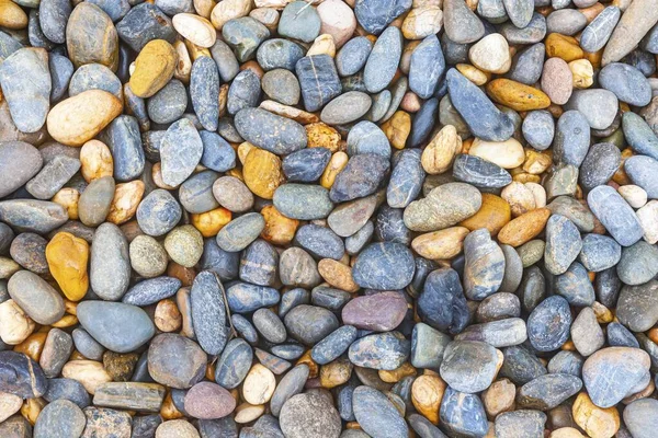 Multi colored river pebbles for use as a background