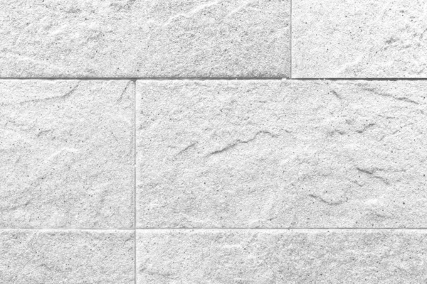 ヴィンテージ柄の質感と背景のシームレスなホワイト花崗岩タイル張りの壁 — ストック写真