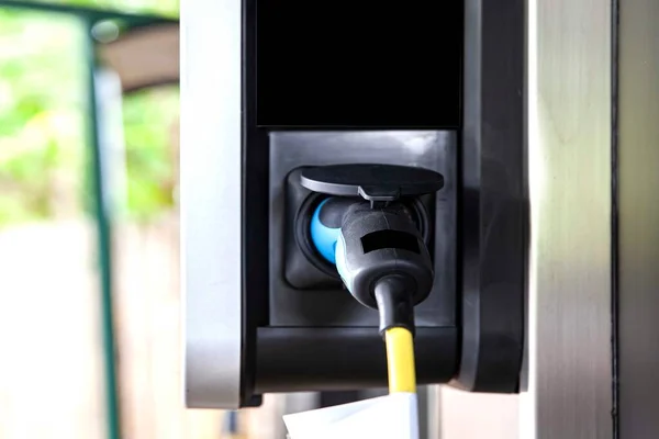 Close-up that holds plugs for electric car chargers