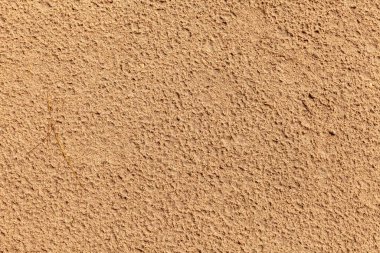 Kum dokusu. Arka plan için kumsal. Üst Manzara. Doğal kum taşı dokusu. Sahildeki kum arka planda. Yaz tasarımları için dalgalı kum arkaplanı