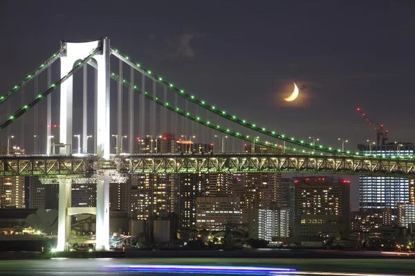 Tokyo rainbow bridge and moon — Stock Photo, Image