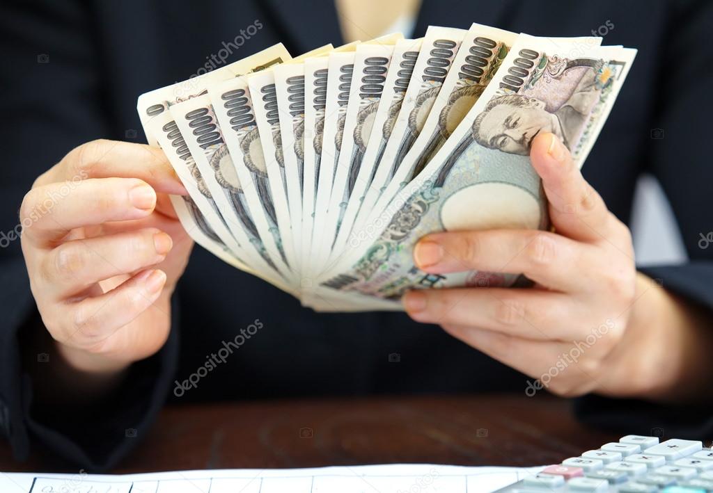 Hand counting money