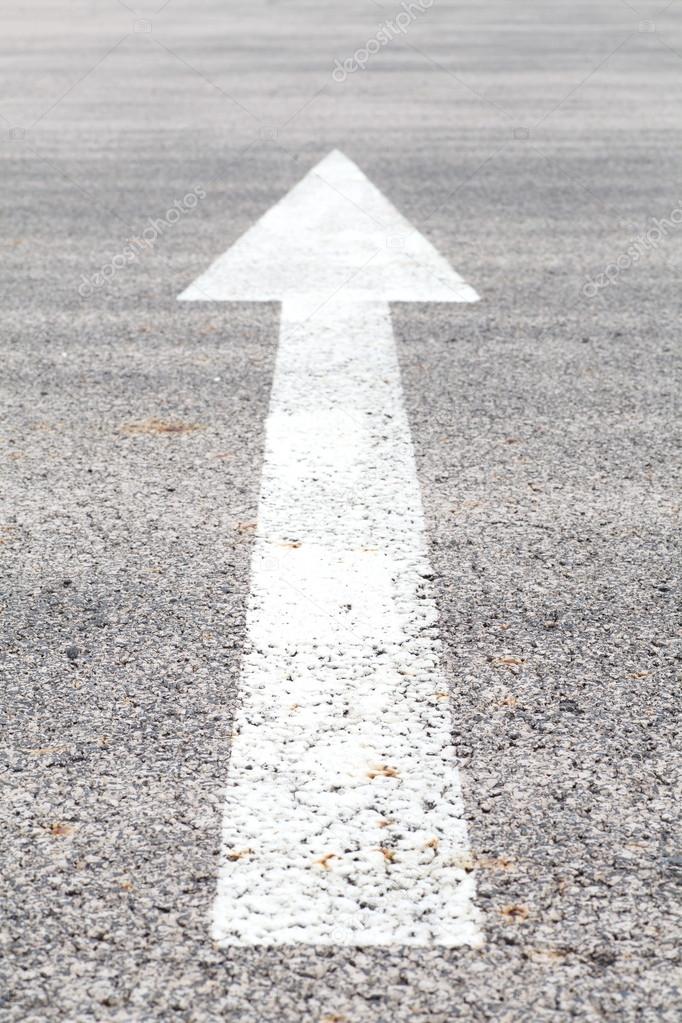 White traffic arrow signage