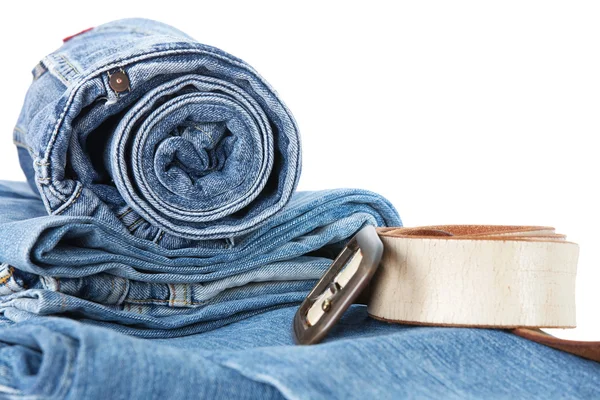 Stack of blue jane and leather belt — Stock Photo, Image