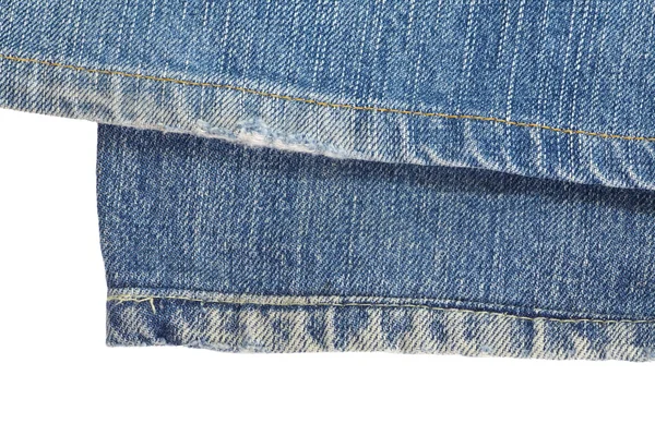 Jean benen textuur geïsoleerd op witte achtergrond — Stockfoto