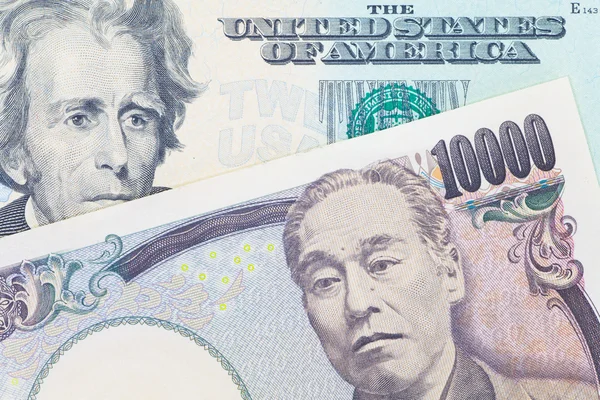 Japon para birimi ve Doları banknot yen — Stok fotoğraf