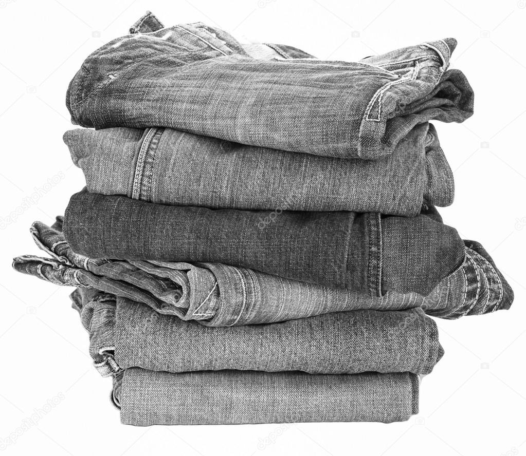 Stack of denim jeans — Stock Photo © Torsakarin #69325923