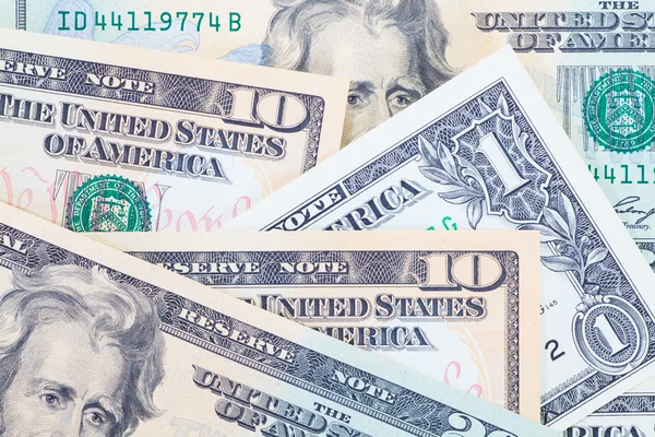 Los billetes en dólares como fondo —  Fotos de Stock