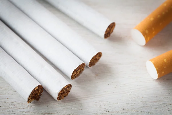 Pile of cigarettes on white — Stock Photo, Image