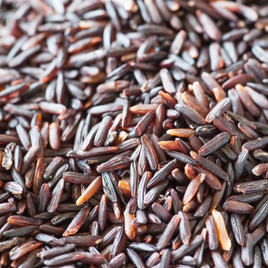 Healthy uncooked brown rice as background