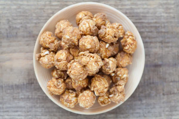Almonds in caramel popcorn — Stok fotoğraf