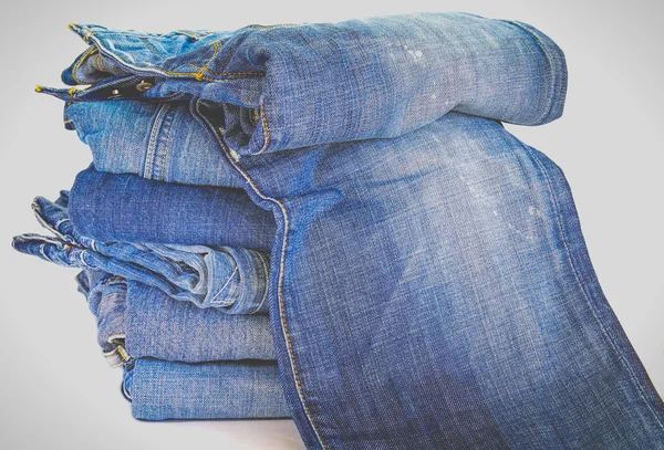 Stapel van denim jeans — Stockfoto