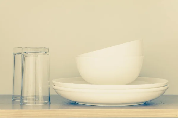 White bowl and empty glass — Stock Photo, Image