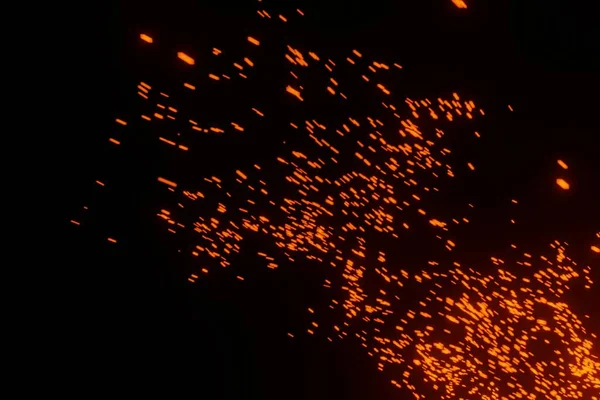 Fire sparks particles on a black background 3D rendering