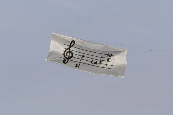 Colorful kites music flying in the sky — Stock Photo, Image