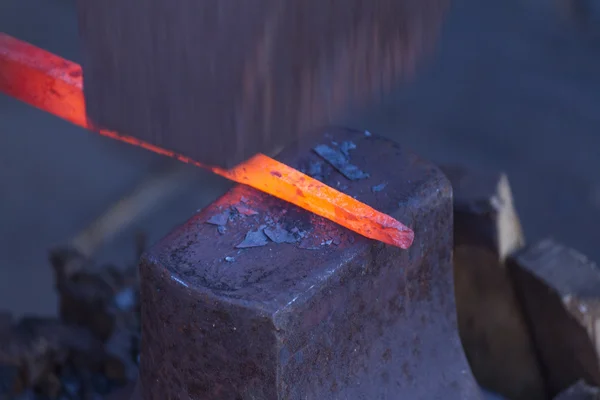 Pedra e um ferro quente — Fotografia de Stock