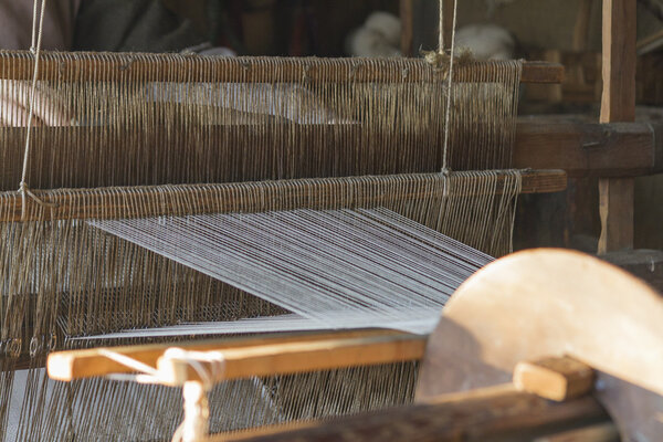 Old loom weaving
