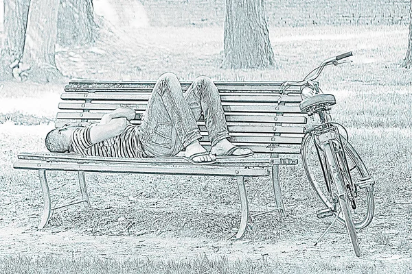 man sleeping on park bench