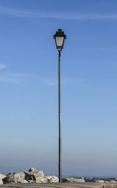 Lamppost in blue sky — Stock Photo, Image
