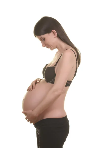 Pregnant woman in studio — Stock Photo, Image