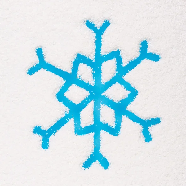 Snowflake painted on frozen window — Stock Photo, Image