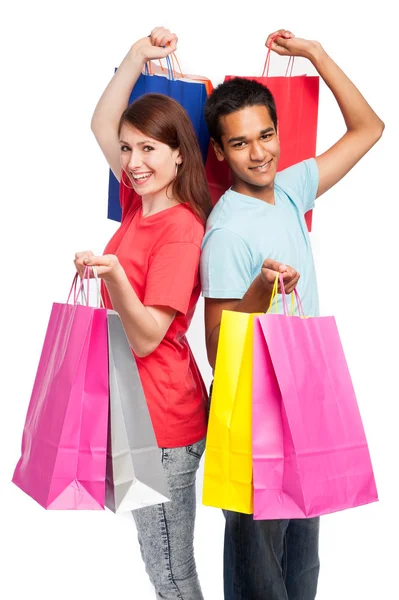 Feliz pareja con bolsas de compras. —  Fotos de Stock