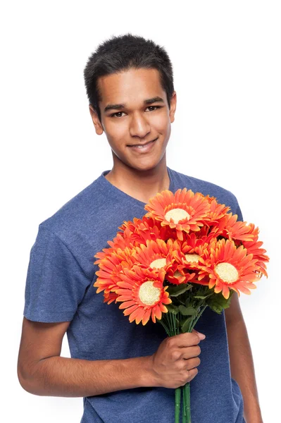 Šťastný muž s květinami — Stock fotografie