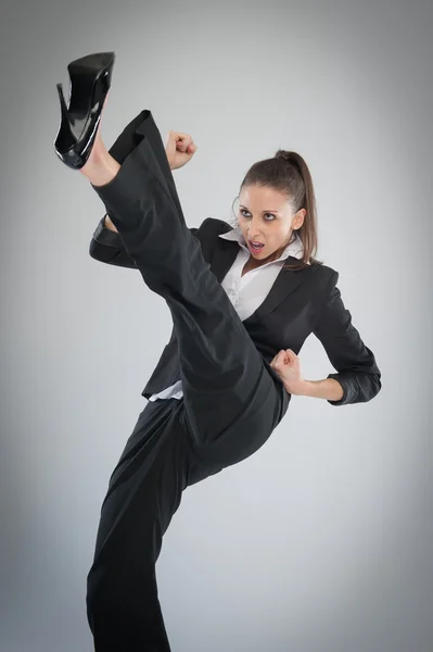 Smart Angry Woman KIcking and Punching. — Stock Photo, Image