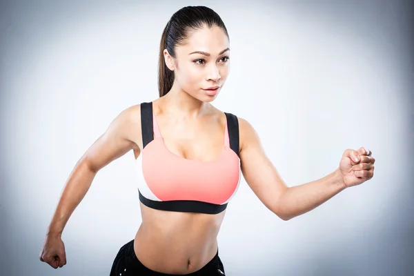 Deportiva asiática chica corriendo Pose —  Fotos de Stock