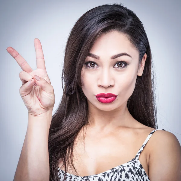 Pouting Red Lips Girl Victory Sign Stock Image