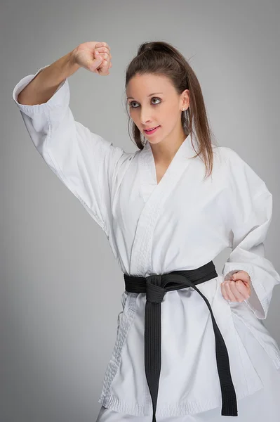 Karate nő fekete öv Jogdíjmentes Stock Képek