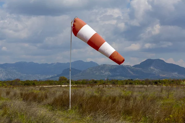 Windsock (wind suit), for determining the direction and speed of the wind. Indispensable equipment of open areas, take-off or landing area