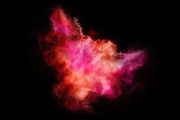 Kleurrijke stofexplosie Particle geïsoleerd op zwart — Stockfoto