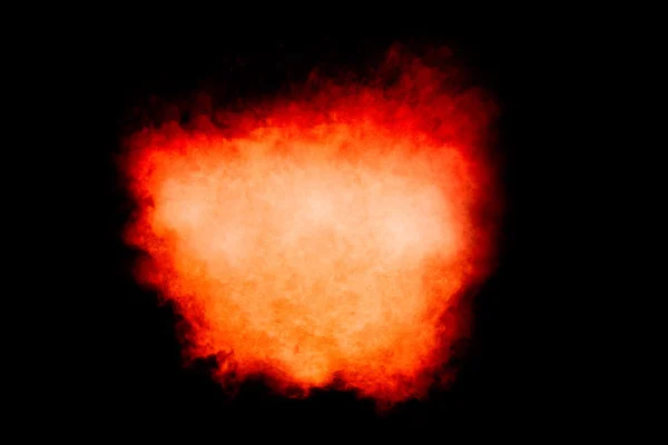 Барвистий вибух частинок пилу ізольовано на чорному — стокове фото