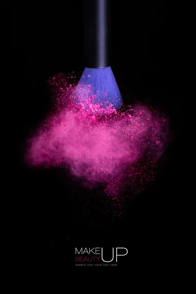 Makeup concept. Brush with powder explosion isolated on black — Stock Photo, Image