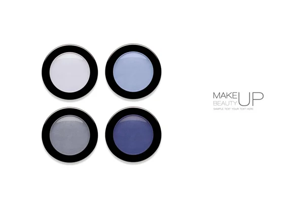 Quatro compactos de sombra de olhos em cores azuis — Fotografia de Stock
