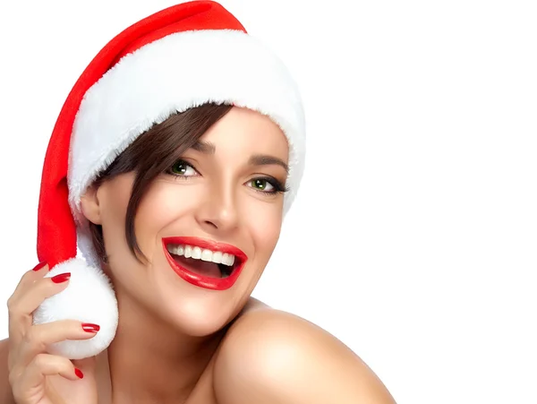 Mutlu Noel Noel Baba şapkalı kız. Güzel büyük gülümseme