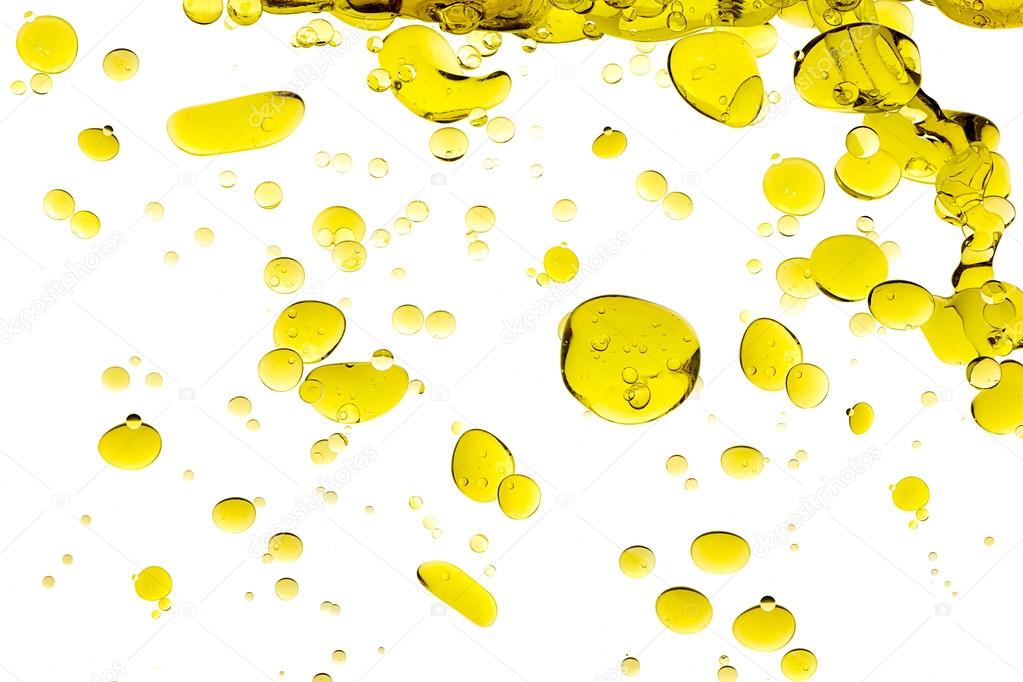 Olive Oil Drops Isolated on White